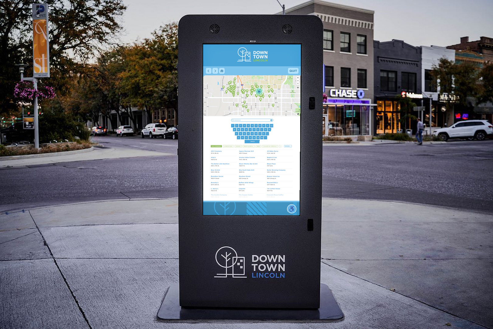 Kiosk screen in downtown Lincoln, NE showing the search page where users can select a restauraant type or use the on screen keyboard to type out what they are looking for.